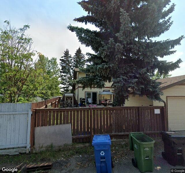 Street view of 655 Woodpark Boulevard SW, Calgary