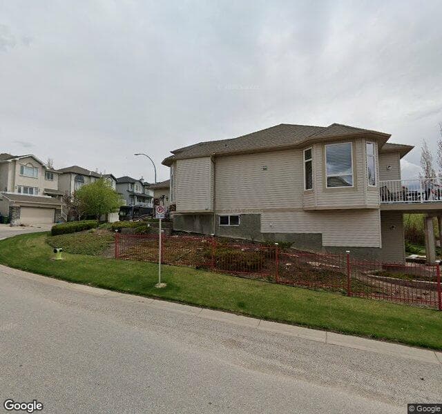 Street view of 27 Rockyledge Rise NW, Calgary