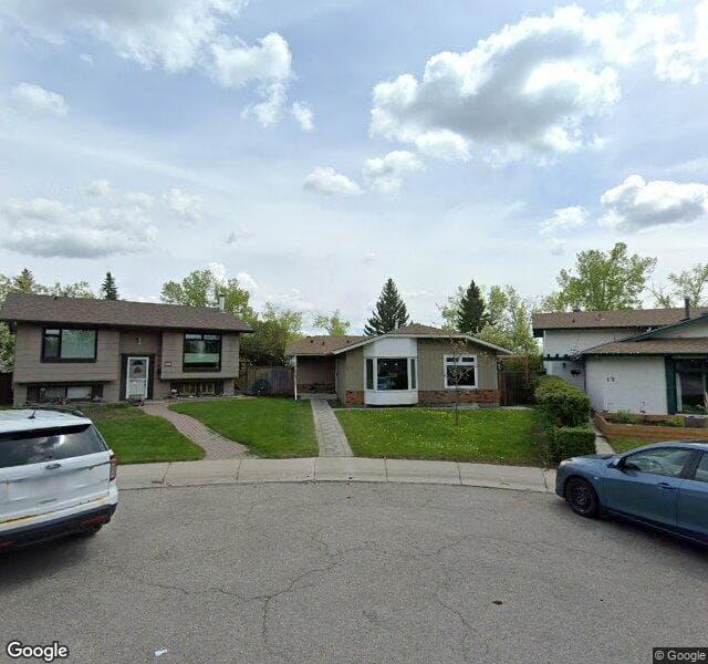 Street view of 23 Midnapore Place SE, Calgary