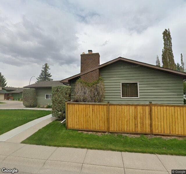 Street view of 211 Deer Run Close SE, Calgary