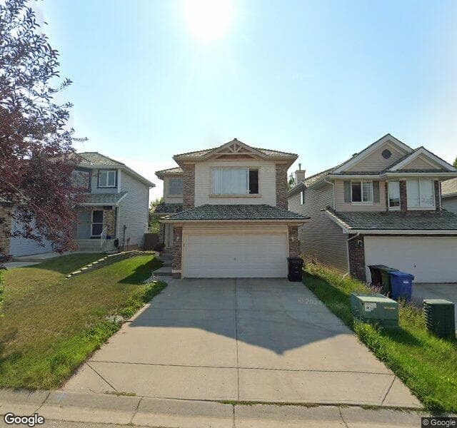 Street view of 18 Spring Crescent SW, Calgary