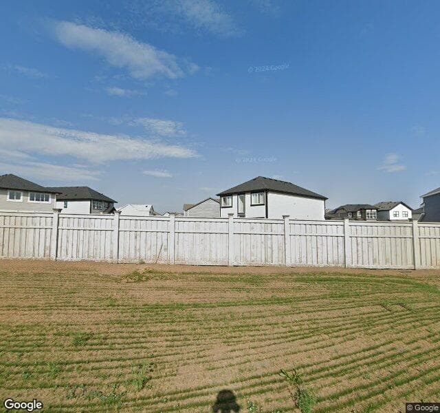 Street view of 98 Magnolia Court SE, Calgary