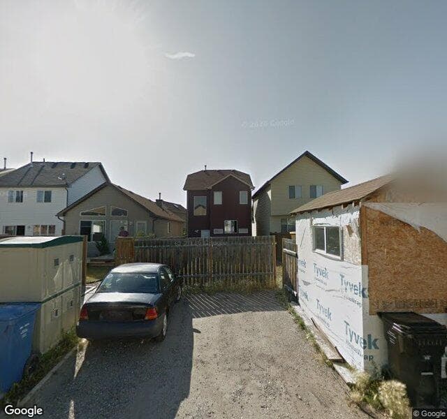 Street view of 1028 New Brighton Gardens SE, Calgary