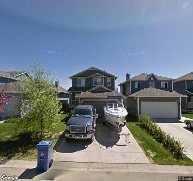 Street view of 54 Bridlepost Green SW, Calgary
