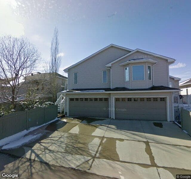 Street view of 136 Hidden Valley Green NW, Calgary