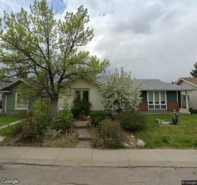 Street view of 107 Shawglen Road SW, Calgary