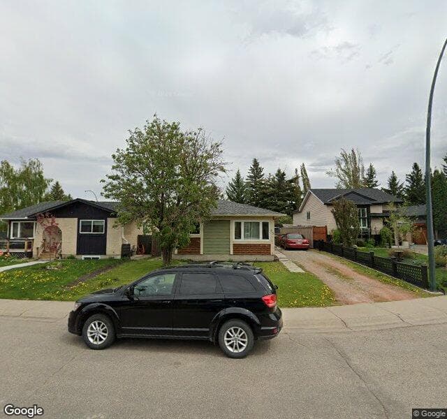 Street view of 75 Deer Lane Place SE, Calgary