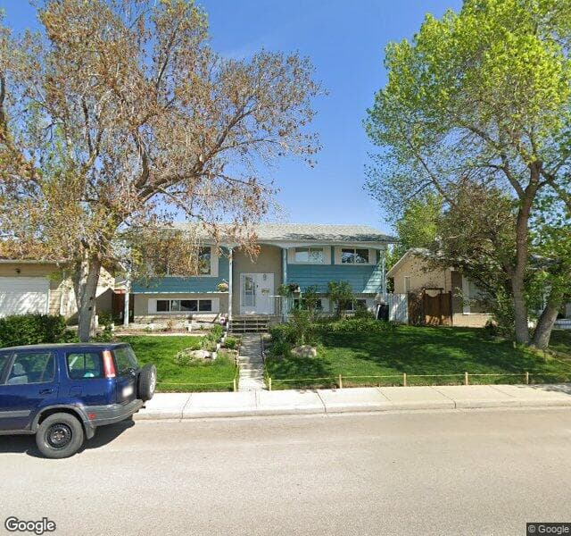 Street view of 1216 Lake Sylvan Drive SE, Calgary