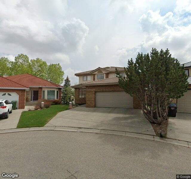 Street view of 221 Hamptons Mews NW, Calgary