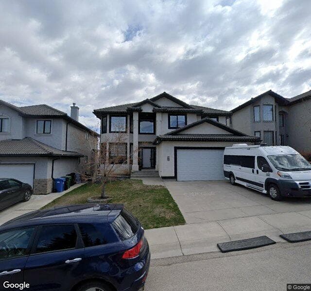 Street view of 105 Hamptons Close NW, Calgary