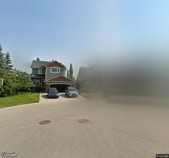 Street view of 26 Cougarstone Mews SW, Calgary
