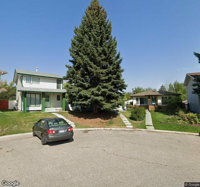Street view of 23 Shawmeadows Bay SW, Calgary