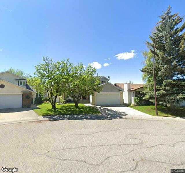 Street view of 40 Woodbrook Close SW, Calgary