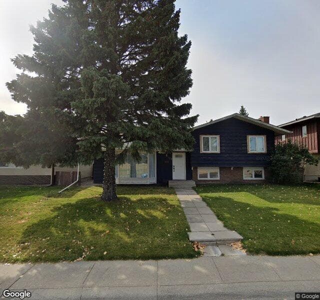 Street view of 1708 Lake Bonavista Drive SE, Calgary