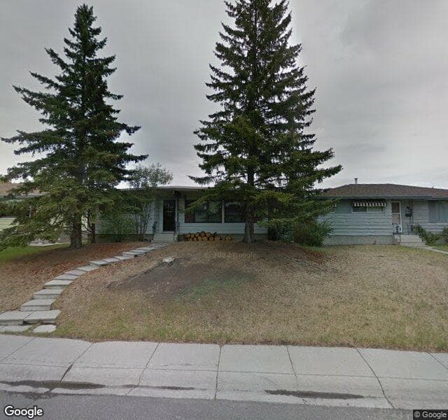 Street view of 7051 Huntford Hill NE, Calgary