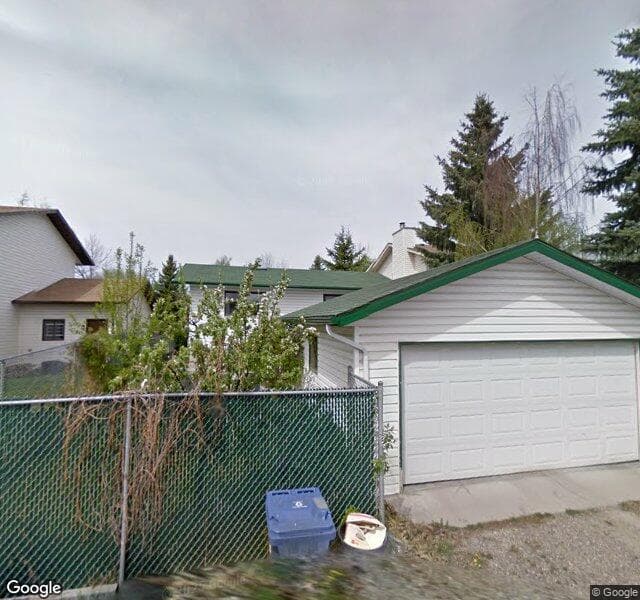 Street view of 84 Woodglen Road SW, Calgary