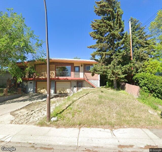 Street view of 7359 Huntertown Crescent NW, Calgary