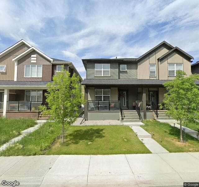 Street view of 335 Wolf Creek Way SE, Calgary