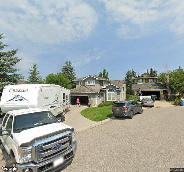 Street view of 50 Woodbriar Place SW, Calgary