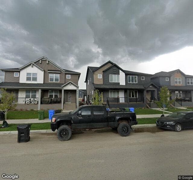 Street view of 911 Creekside Boulevard SW, Calgary
