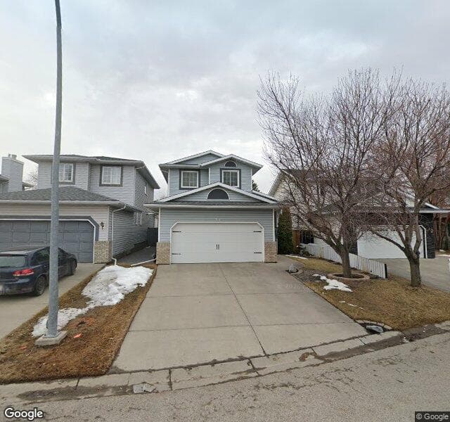 Street view of 56 Riverwood Circle SE, Calgary