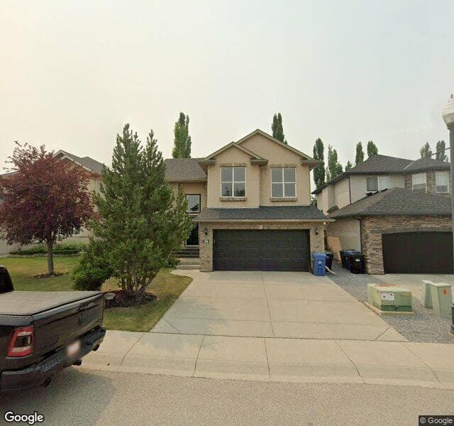 Street view of 39 Strathlea Place SW, Calgary