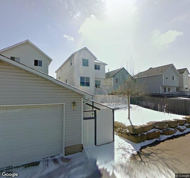 Street view of 10728 Hidden Valley Drive NW, Calgary