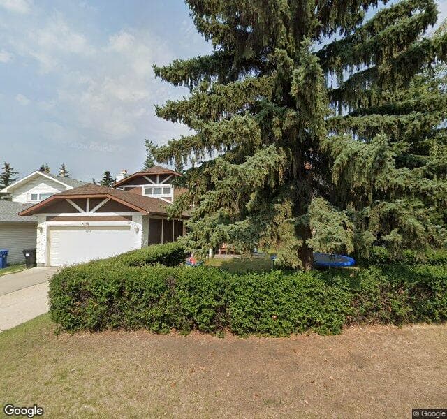 Street view of 39 Woodmont Road SW, Calgary