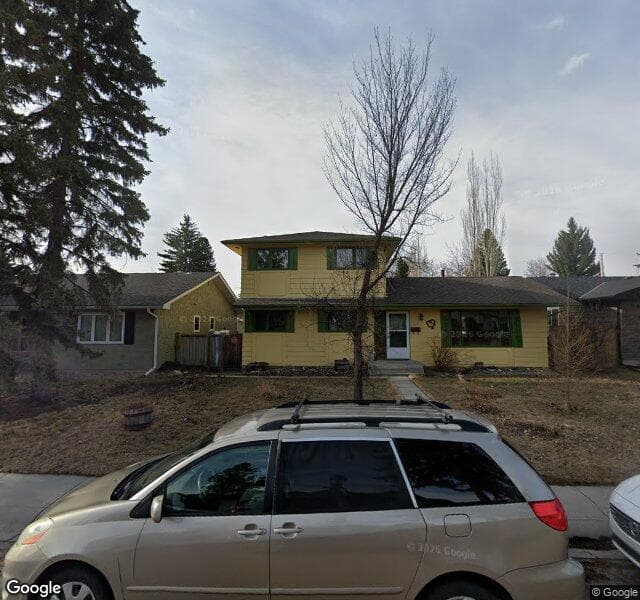 Street view of 1023 Lake Christina Way SE, Calgary