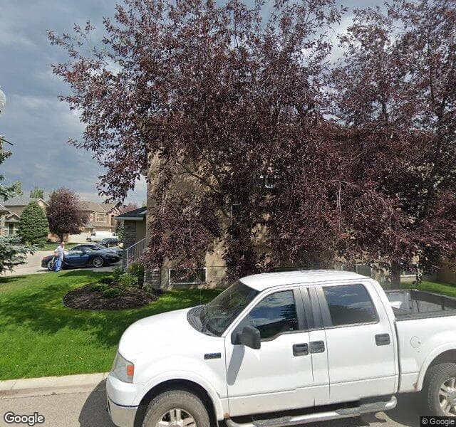 Street view of 136 Strathlea Court SW, Calgary