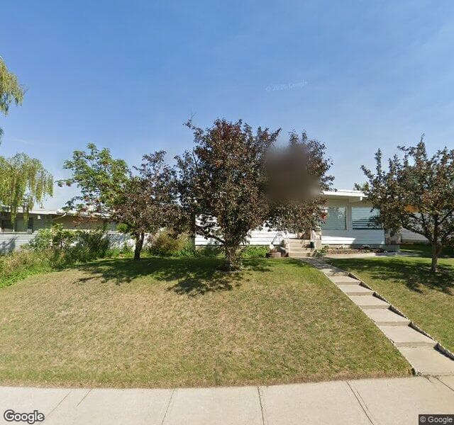 Street view of 2128 8 Avenue NE, Calgary