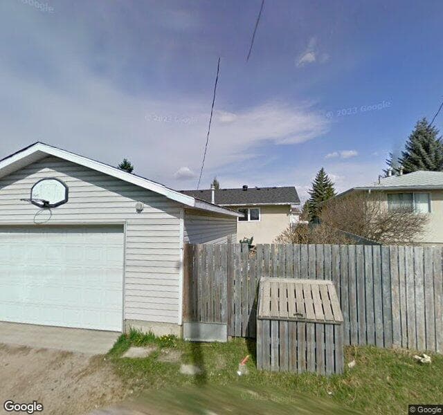 Street view of 32 Huntmeadow Road NE, Calgary