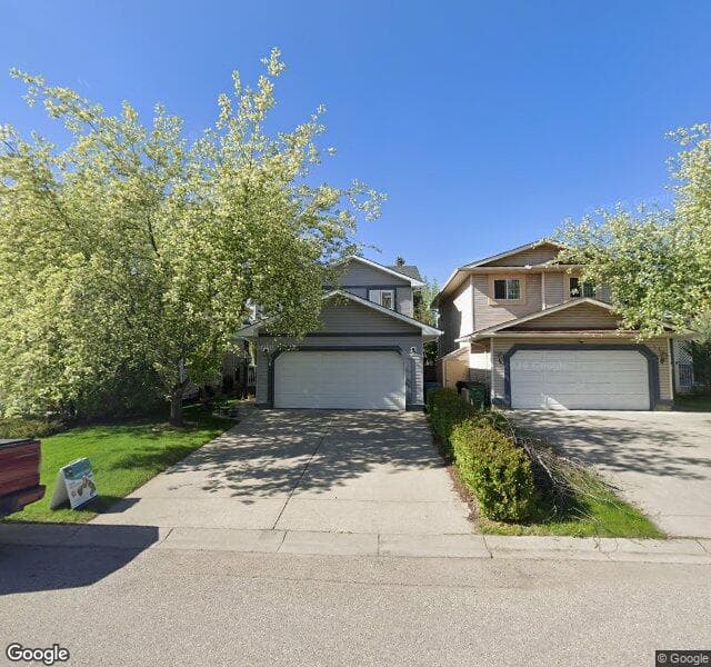 Street view of 56 Riverwood Close SE, Calgary