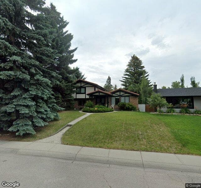Street view of 1035 Lake Wapta Way SE, Calgary