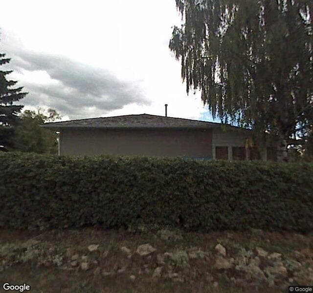 Street view of 93 Capri Avenue NW, Calgary