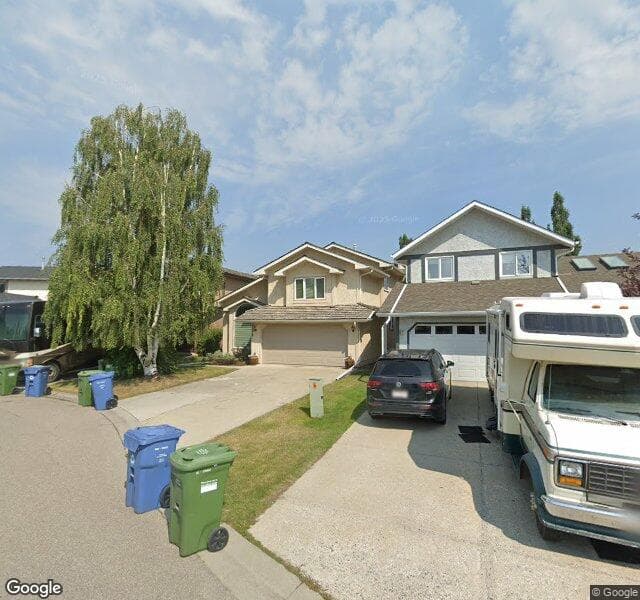Street view of 781 Woodbriar Place SW, Calgary