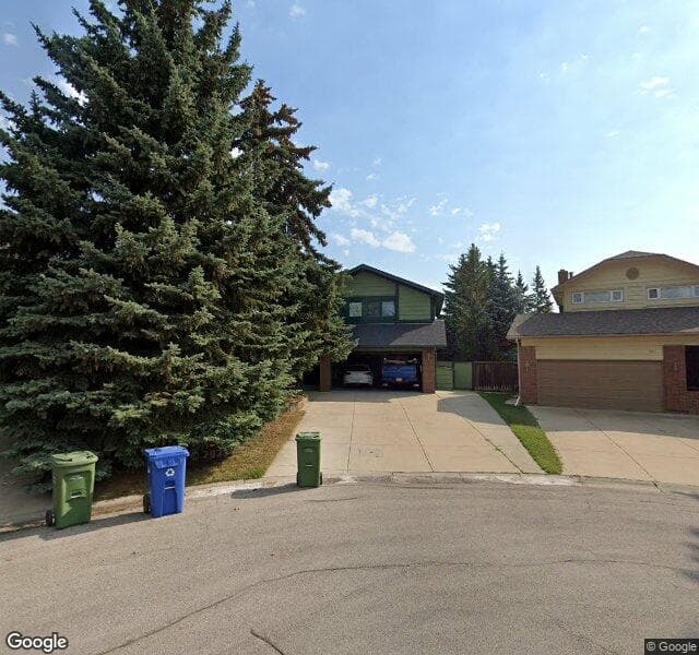 Street view of 31 Woodgreen Place SW, Calgary