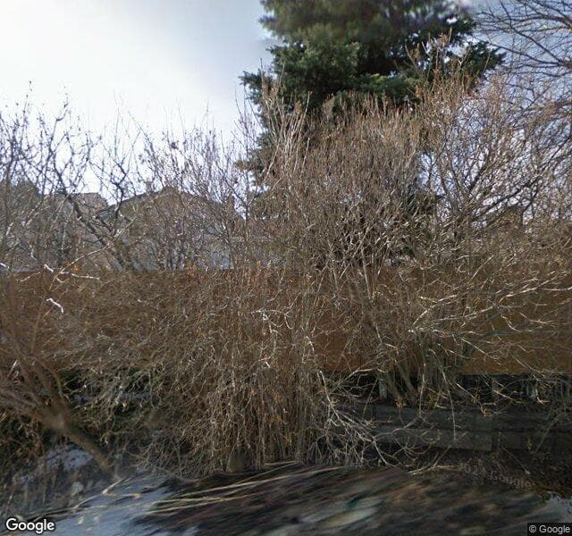 Street view of 100 Woodlark Drive SW, Calgary