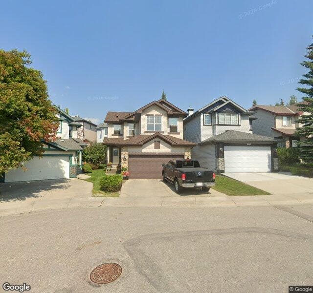 Street view of 23 Spring Village Lane SW, Calgary