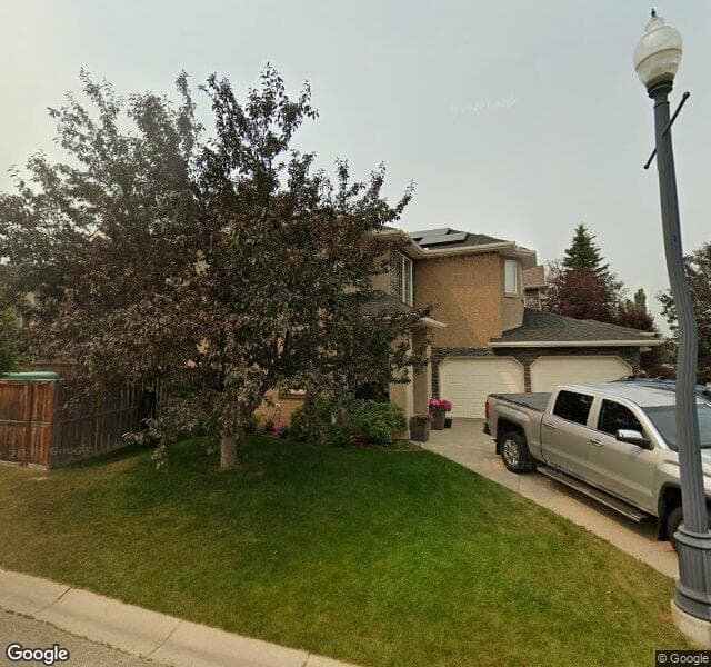 Street view of 69 Strathlea Place SW, Calgary