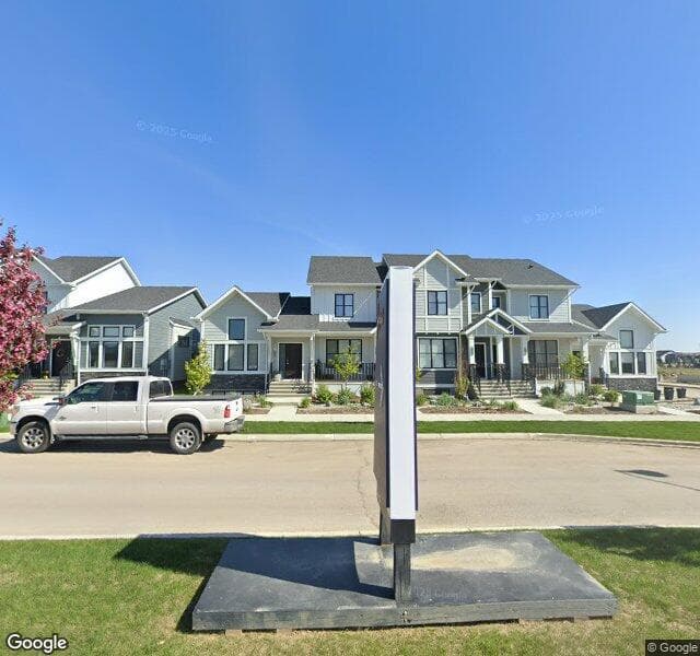 Street view of 1121 Creekside Boulevard SW, Calgary