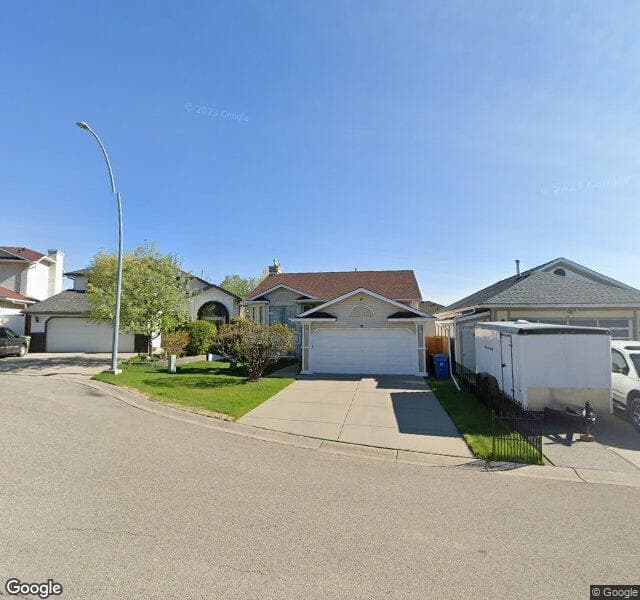 Street view of 135 Sandalwood Place NW, Calgary