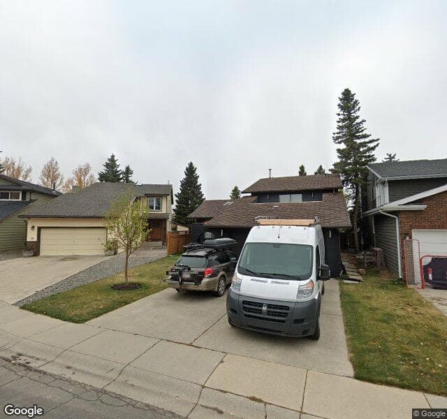 Street view of 803 Coach Bluff Crescent SW, Calgary
