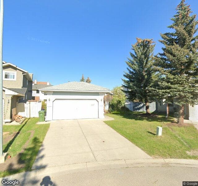 Street view of 507 Hidden Vale Place NW, Calgary