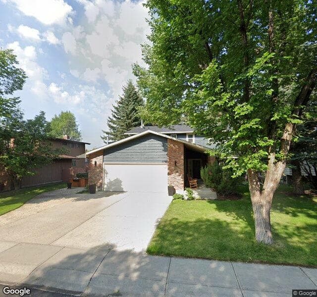 Street view of 875 Woodpark Way SW, Calgary
