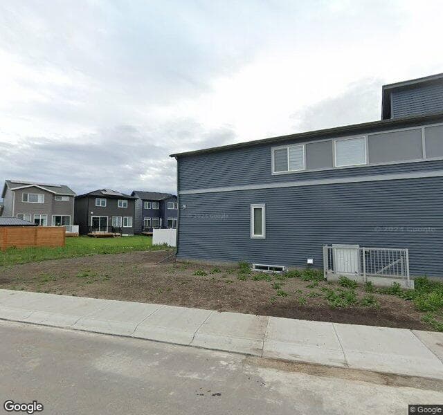 Street view of 468 Wolf Creek Way SE, Calgary