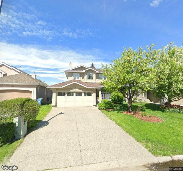 Street view of 58 Mckenzie Lake Place SE, Calgary