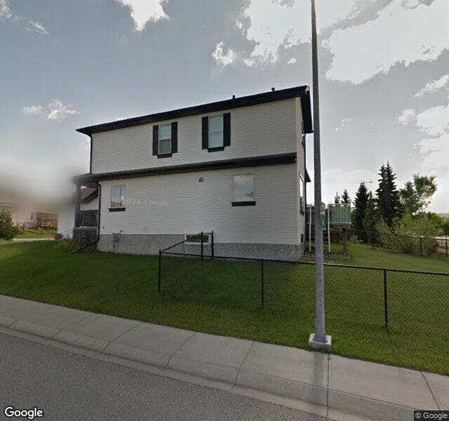 Street view of 83 Rocky Ridge Heath NW, Calgary