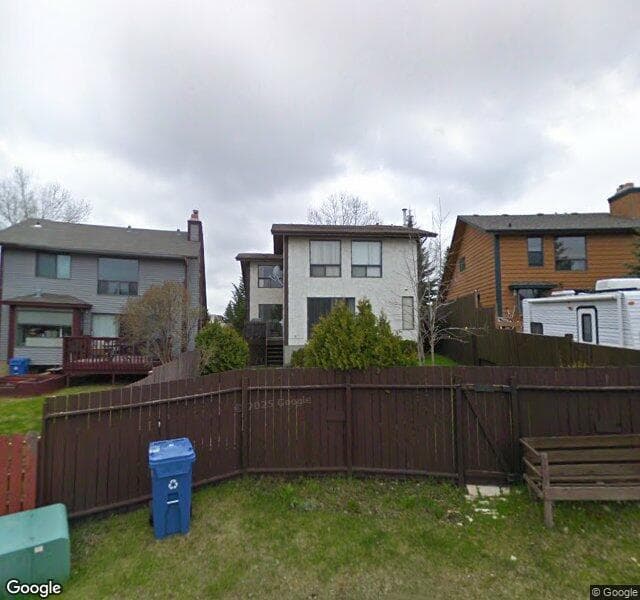 Street view of 223 Coachwood Crescent SW, Calgary