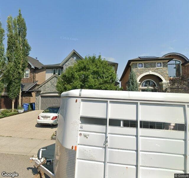 Street view of 75 Cougar Plateau Circle SW, Calgary